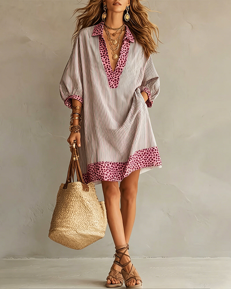Vestido con paneles estampados de leopardo, mangas abullonadas y camisa a rayas.